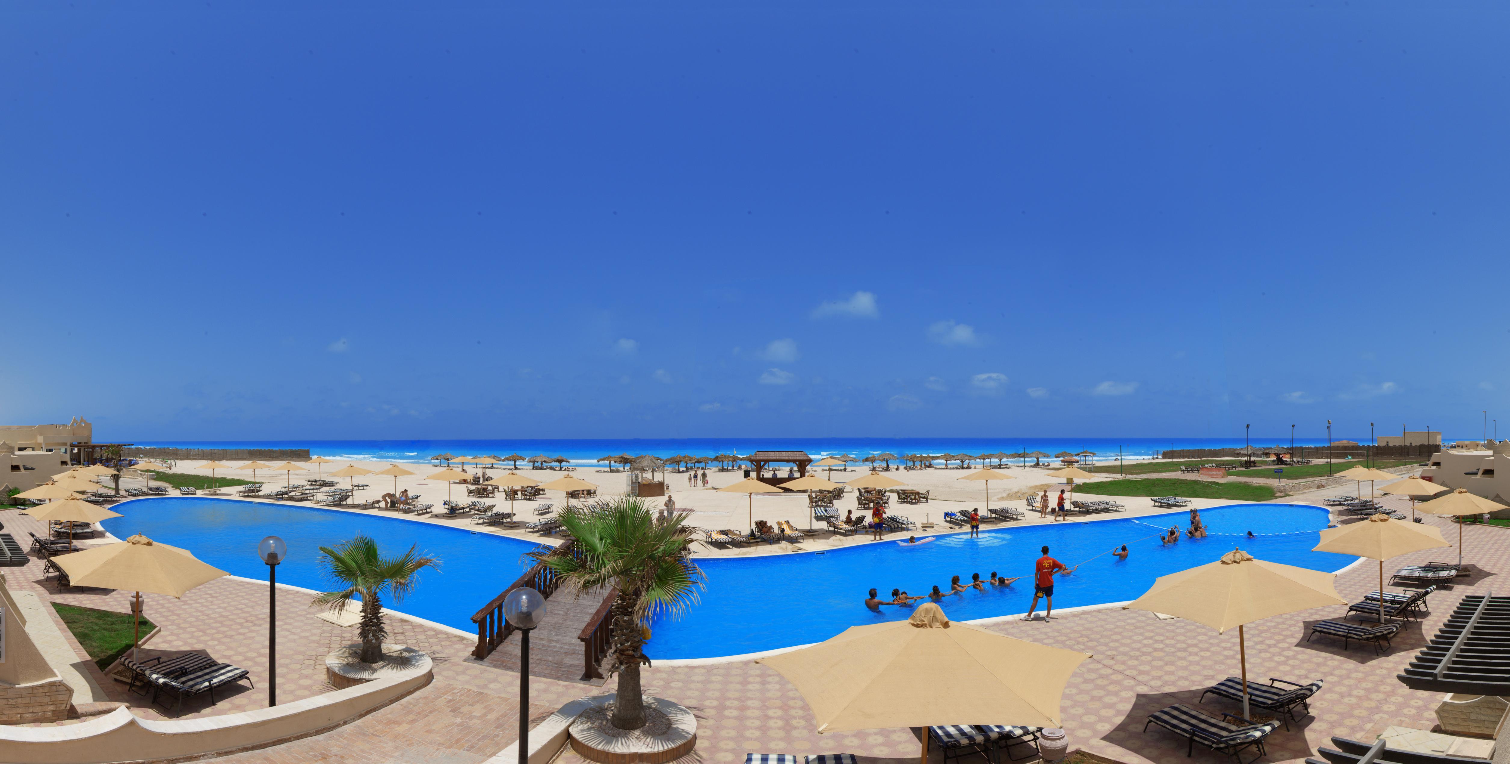 Borg El Arab Beach Resort Extérieur photo The beach at the resort