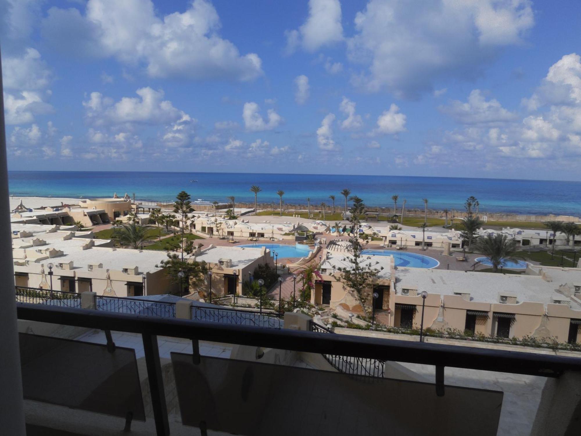 Borg El Arab Beach Resort Extérieur photo View of the beach from the hotel