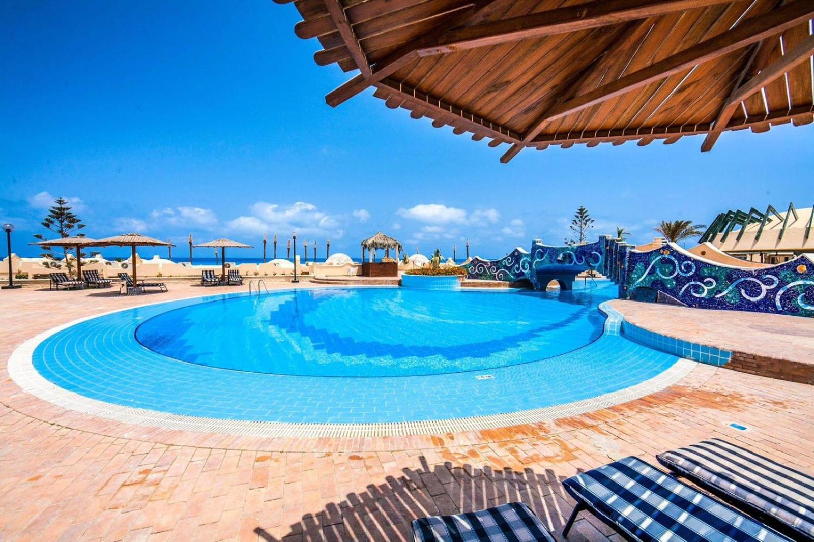 Borg El Arab Beach Resort Extérieur photo The swimming pool at the hotel