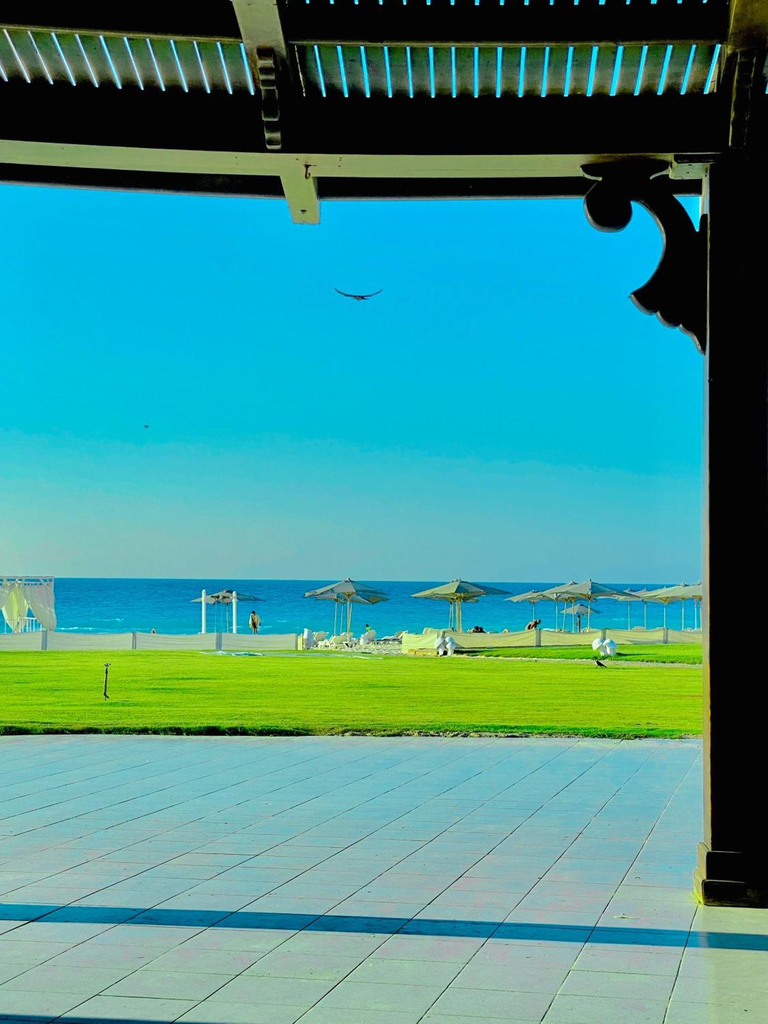 Borg El Arab Beach Resort Extérieur photo The beach at the Grand Hotel